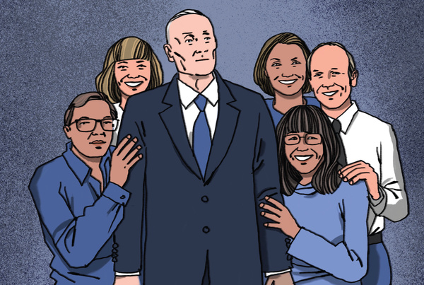 Patient in a suit surrounded by members of his care team