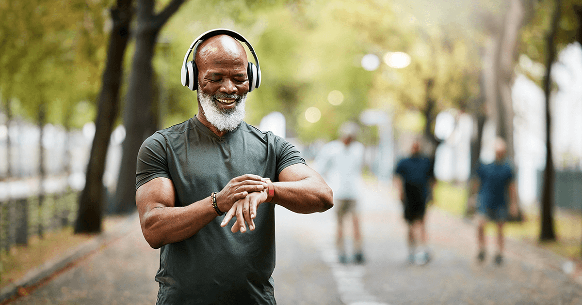 Workout, wellness and training with a senior male athlete or runner tracking his health