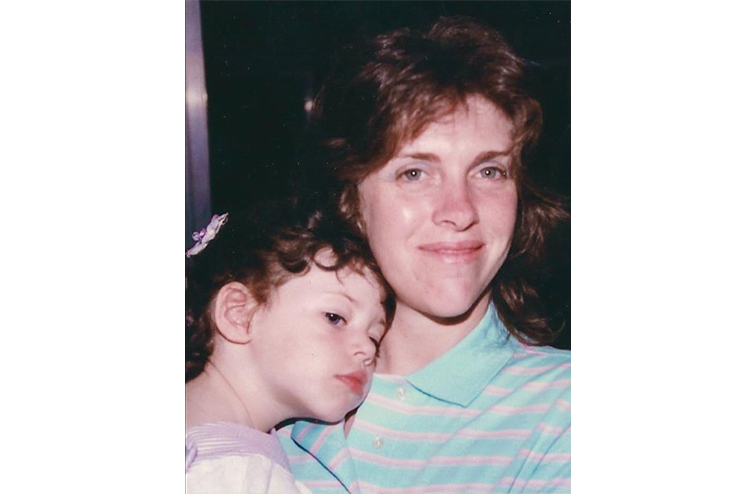 A young Miller Rogan pictured with her mother, Adele.