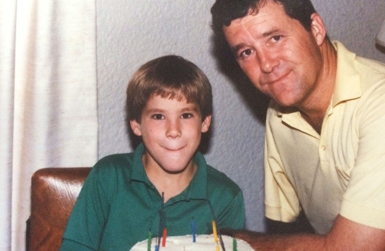 Ryan Reynolds celebrating his birthday as a child with his father