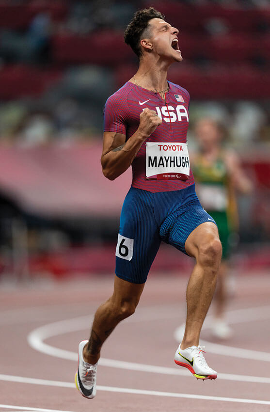 Nick Mayhugh celebrating on the track after a race
