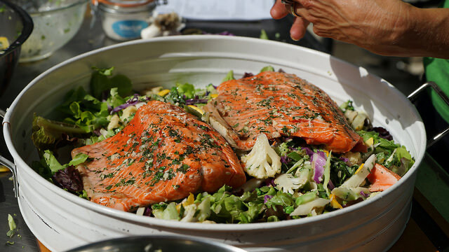 Simple garlic rubbed salmon with vegetables and sweet basil dressing